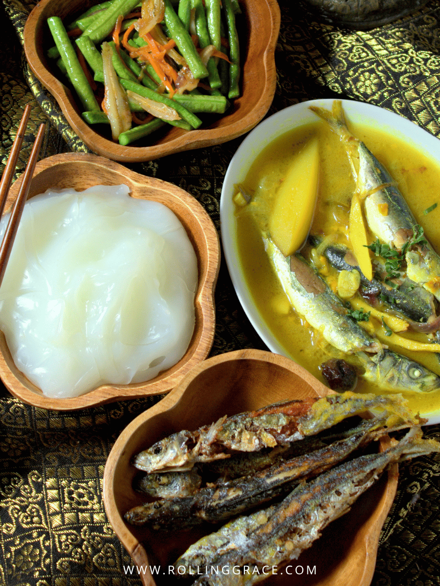 Best Sarawak Food: 20 Must-Try Traditional Dishes Guide 9 Linut Melanau translucent sago porridge twirled on a wooden fork with sambal belacan dipping sauce