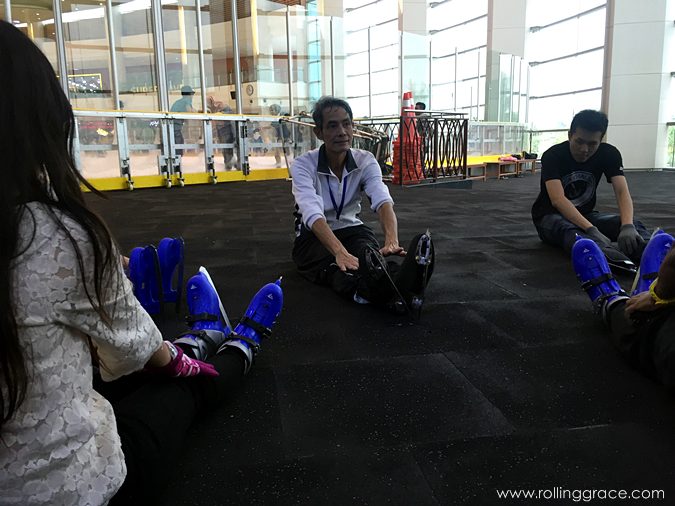 Icescape Ice Rink Putrajaya: Ticket Prices and Reviews 2026 8 Visitors putting on rental ice skates at Icescape Ice Rink, IOI City Mall Putrajaya, Malaysia