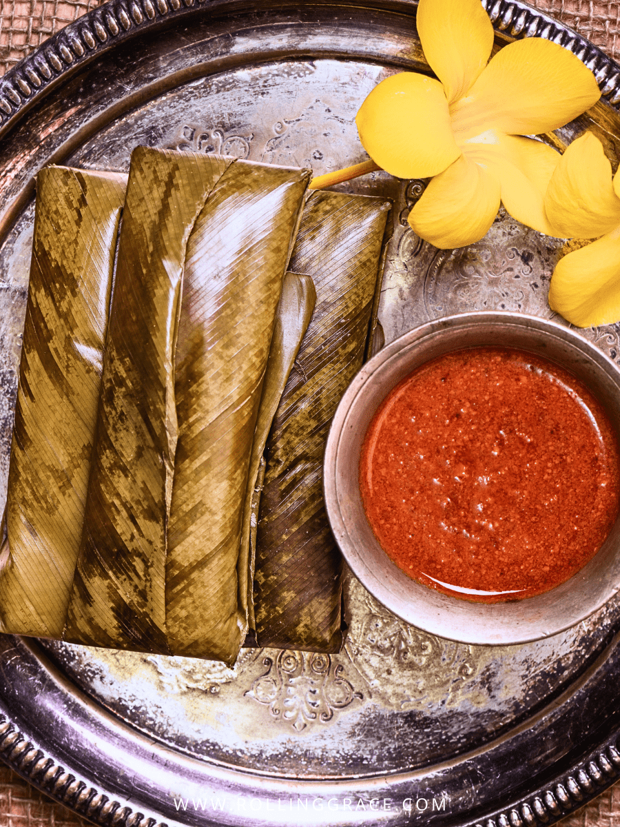 What to Eat in Brunei: 9 Best Traditional Bruneian Dishes 7 Kelupis Bruneian glutinous rice rolls wrapped in nyirik leaves served with sambal