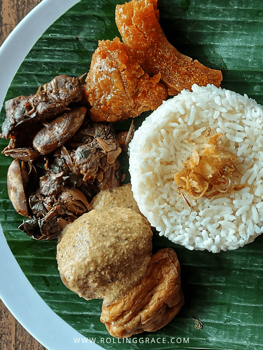 What to Eat in Brunei: 9 Best Traditional Bruneian Dishes 2 Nasi Katok Brunei B plate of rice fried chicken and sambal on banana leaf