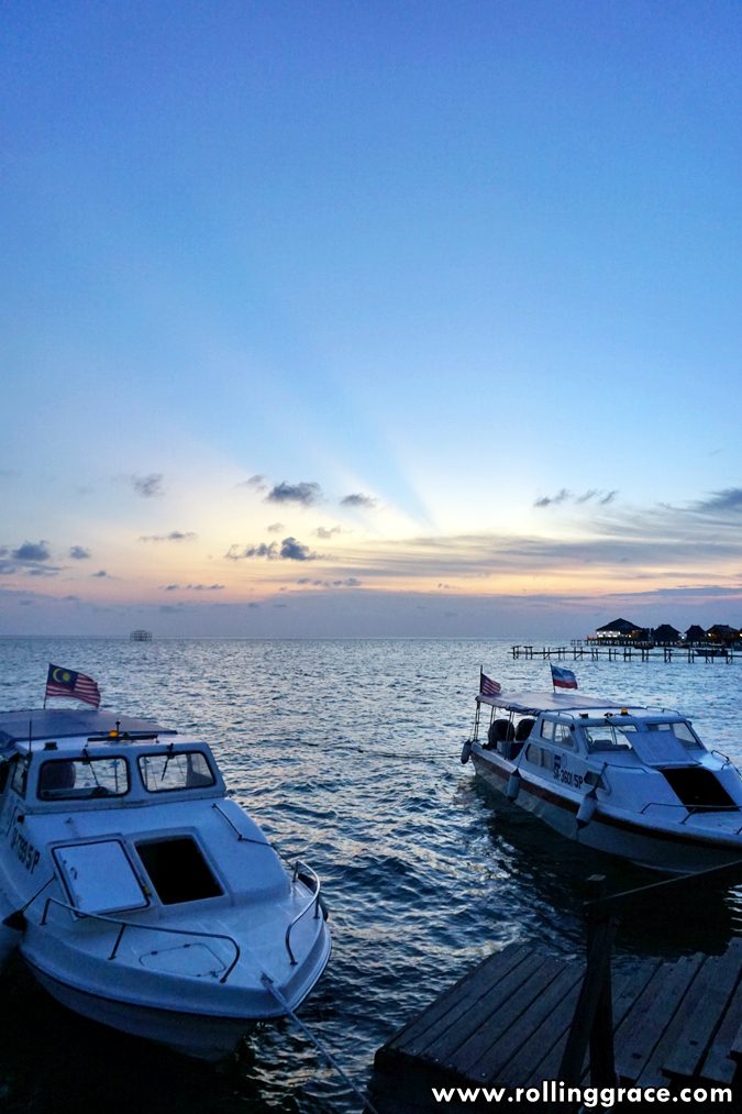 Sipadan Mabul Resort SMART Sabah: 7 Essential Travel Tips 14 Sipadan Mabul Resort dive boats lined up at the jetty in early morning light Mabul Island Sabah