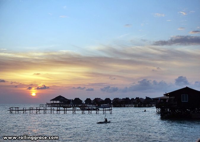 Sipadan Mabul Resort SMART Sabah: 7 Essential Travel Tips 15 Sunset view from Sipadan Mabul Resort jetty looking toward the Mabul Water Bungalows in Sabah