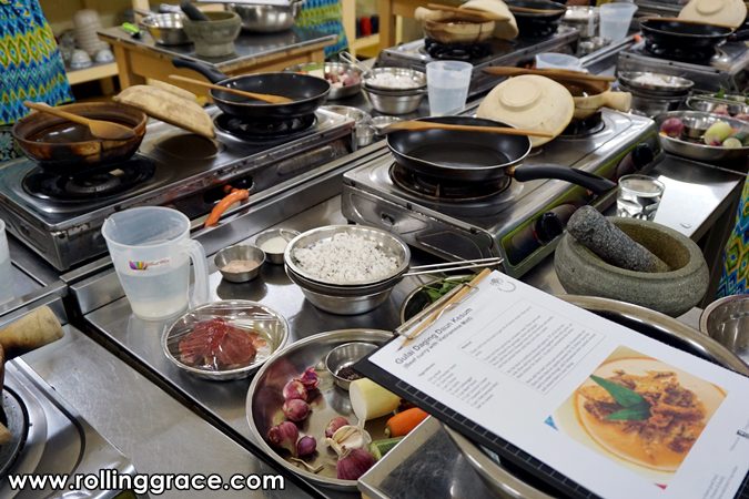 Gulai Daging Daun Kesum & Acar Rampai: 2 Easy Recipes 3 Tray of prepared ingredients for Gulai Daging Daun Kesum including beef coconut shallots and chilli paste at TSG Cooking School Penang