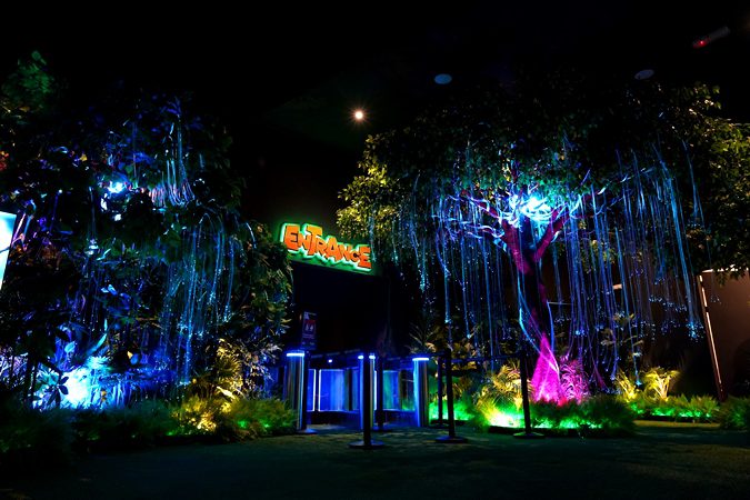 Wetland Studios Putrajaya external architecture lit with colorful LED displays creating magical nighttime family experience at Putrajaya indoor theme park