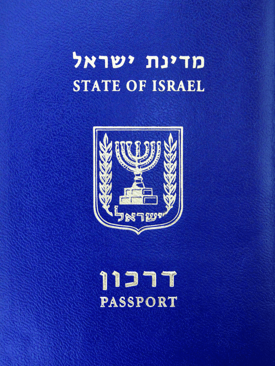 Israeli passport cover in blue with Hebrew and English text, banned by 14 countries that do not recognise Israel