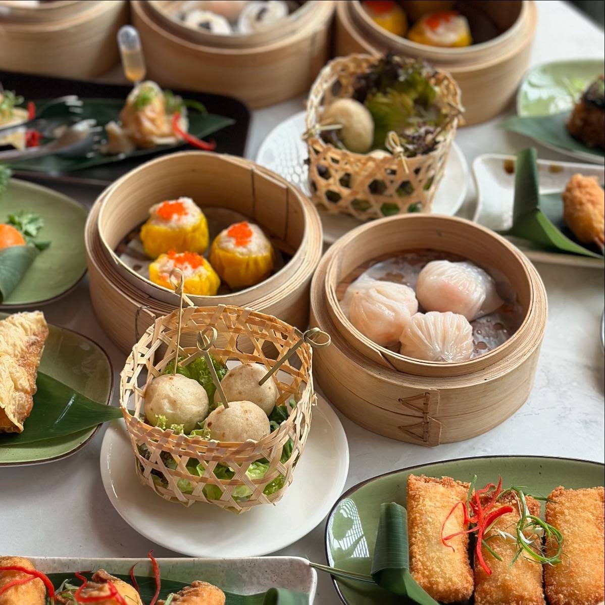 10 Best Halal Dim Sum in KL for a Pork-free Chinese Feast 9 Spread of pork-free dim sum baskets and spring rolls at Bakul DimSum, The Five in Kuala