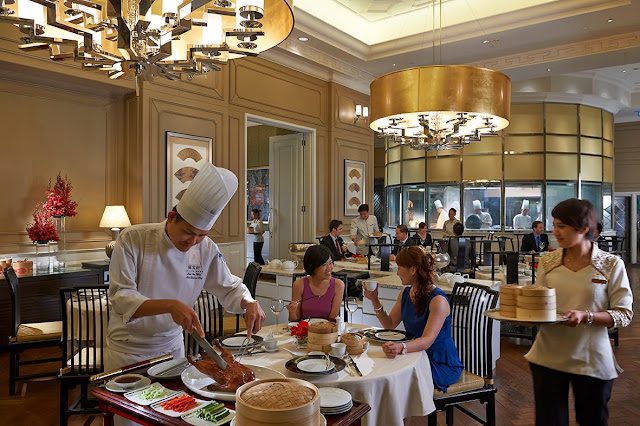 10 Best Halal Dim Sum in KL for a Pork-free Chinese Feast 8 Elegant dining room with chefs preparing dim sum at Lai Po Heen, Mandarin Oriental Kuala Lumpur