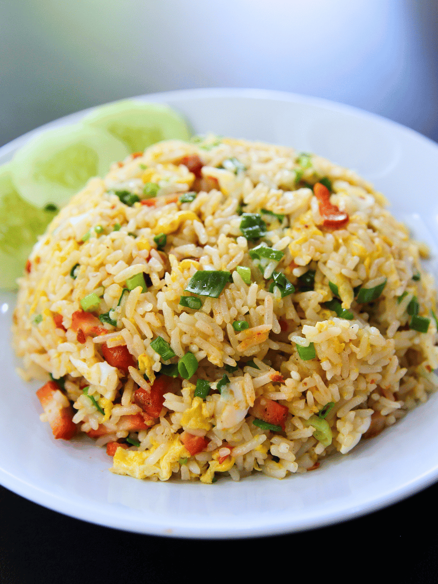 Chinese style fried rice or chow fan on a white plate, a wok-fired Malaysian rice dish