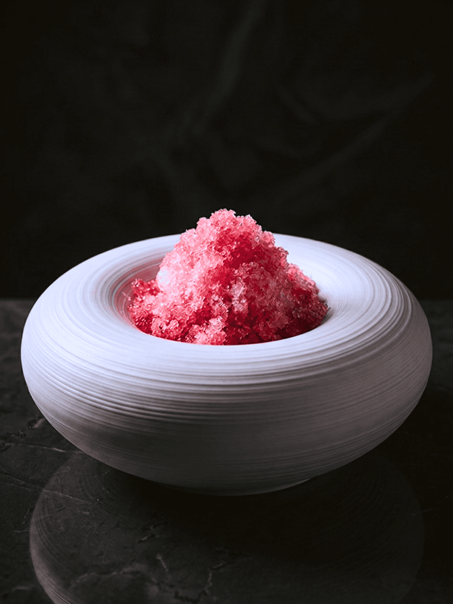 Bright pink pre-dessert sorbet in a white ceramic bowl at Ortensia Shanghai