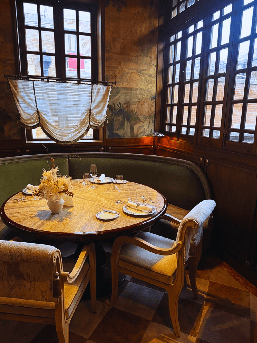Private dining room with heritage windows and set table at Ortensia Shanghai