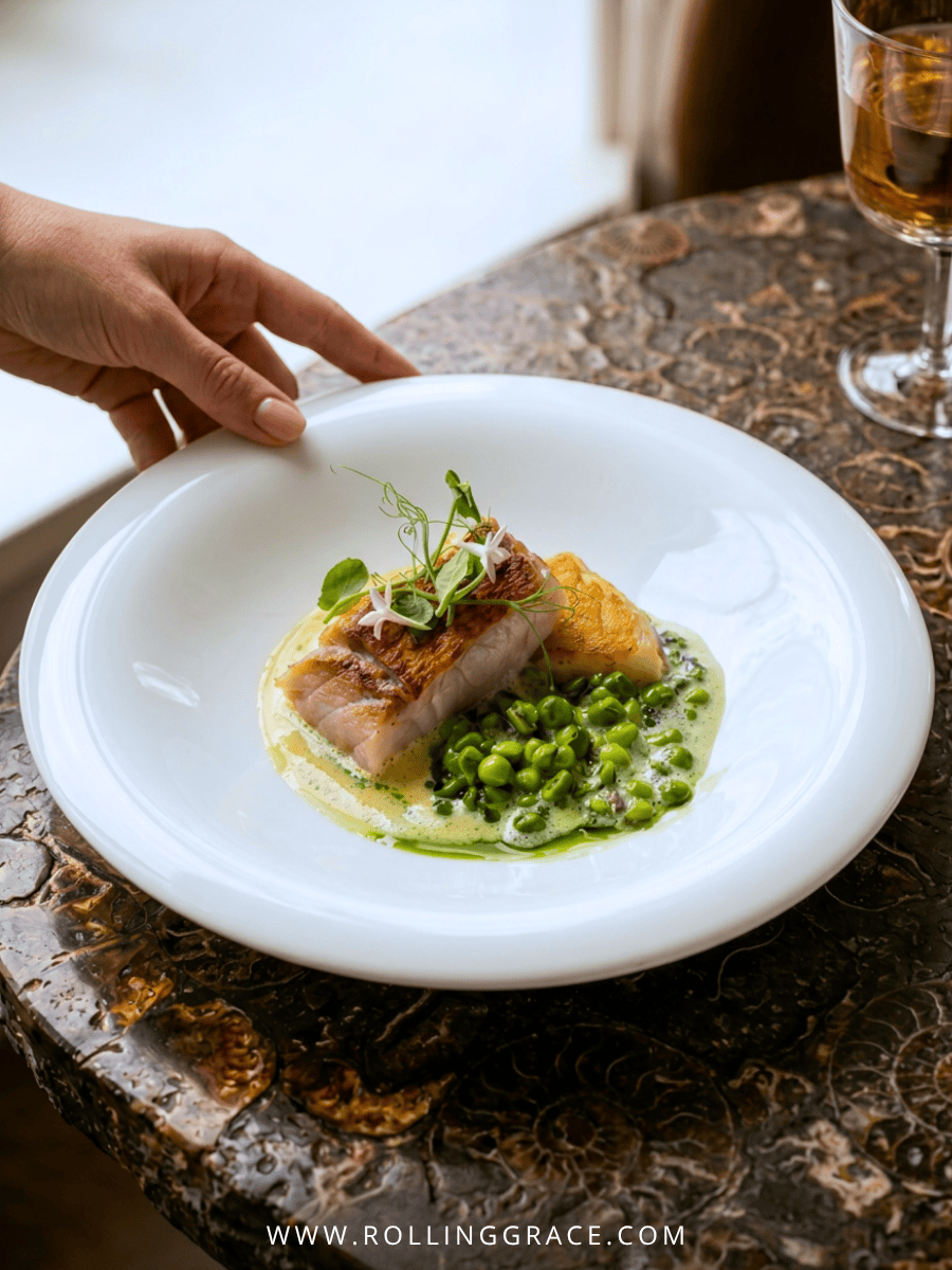 Seasonal fish with fish maw and green pea puree finished with clam bouillon at Ortensia Shanghai