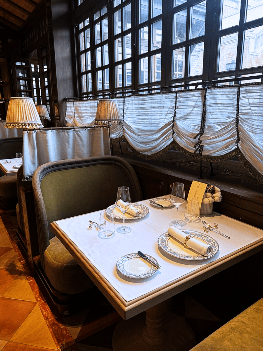 Table setting with wine glasses in the heritage dining room at Ortensia Shanghai