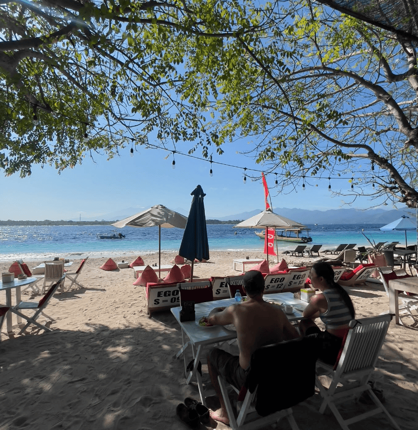8 Best Shisha in Lombok for a Stunning Sunset Session 4 Beachfront loungers and umbrellas at Ego Beachfront Restaurant on Gili Trawangan