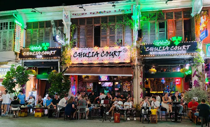 10 Best Shisha in Penang: Exciting Island Hookah Experience 12 Busy heritage shophouse frontage of Chulia Court at night in George Town Penang