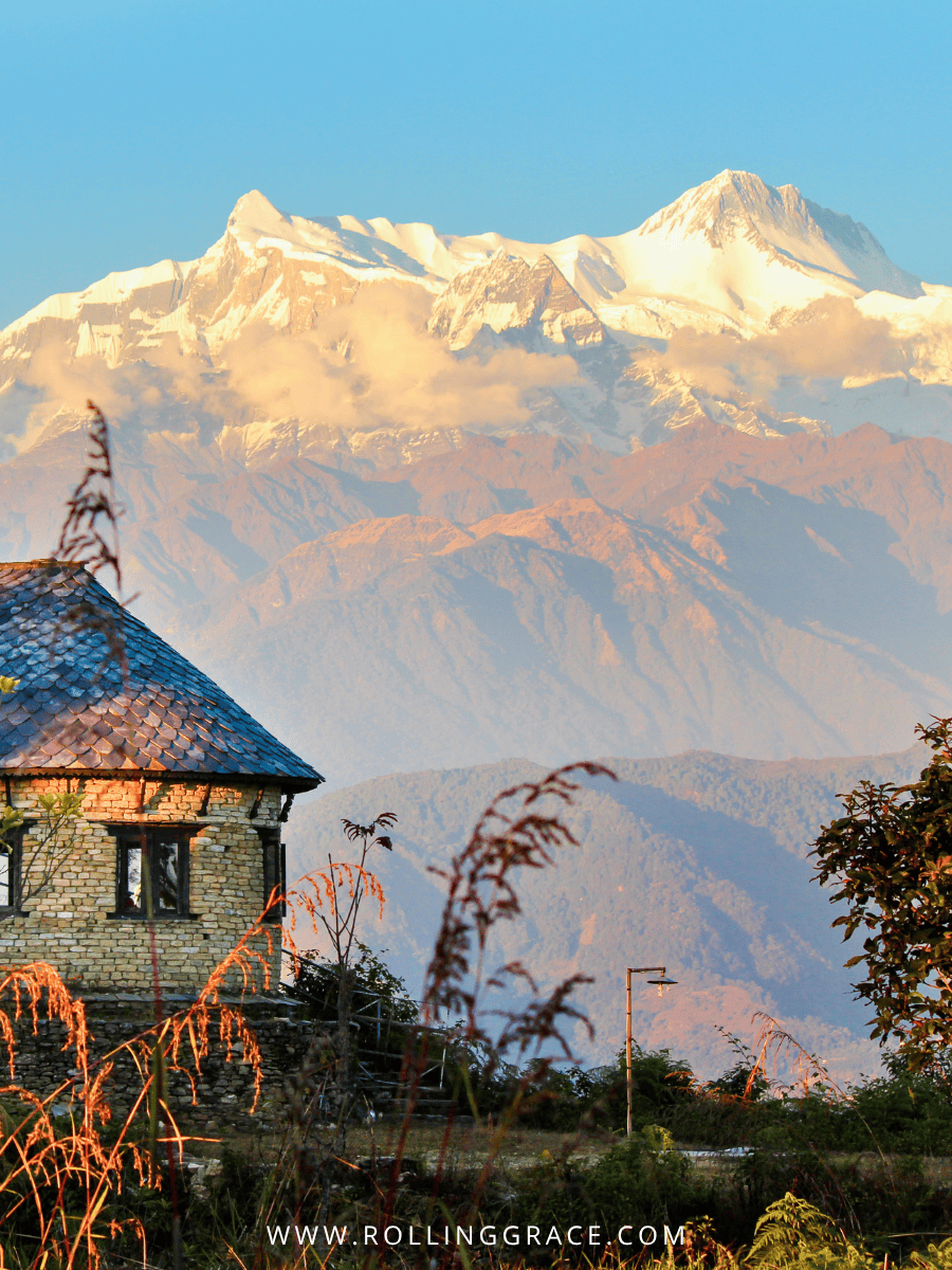 Stone village house below the snow-capped Annapurna range at Astam Nepal