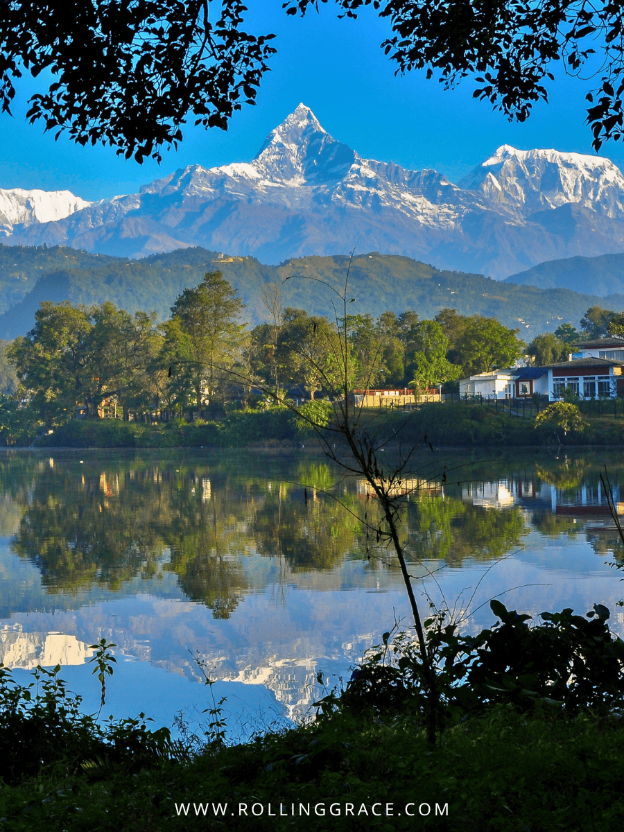 Annapurna peaks reflected in Phewa Lake at Pokhara Nepal