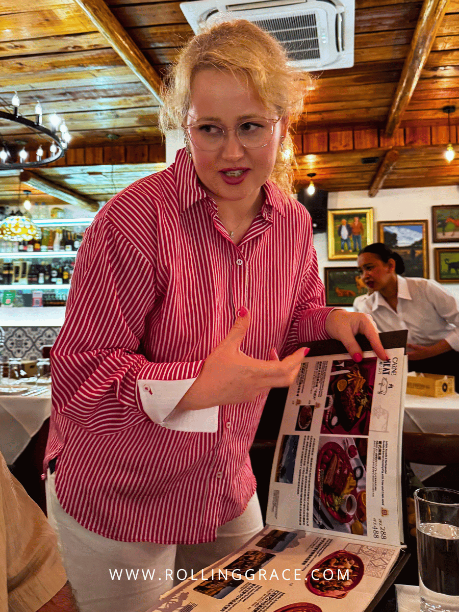 Amália Portuguese Restaurant Macau: 7 Best Dishes to Try 6 Owner Tatiana at Amália Portuguese Restaurant Macau during a live music evening