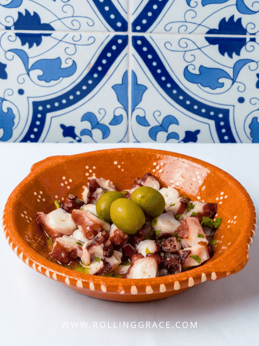 Amália Portuguese Restaurant Macau: 7 Best Dishes to Try 11 Salada de Polvo Portuguese octopus salad on a blue and white plate at Amália Portuguese Restaurant Macau