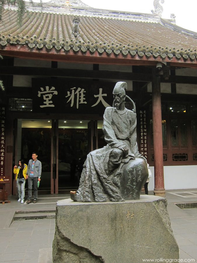 7 Stunning Things to See at Du Fu Thatched Cottage Chengdu 13 Visitors at the entrance of Da Ya Tang Hall with Du Fu statue at Du Fu Thatched Cottage Chengdu