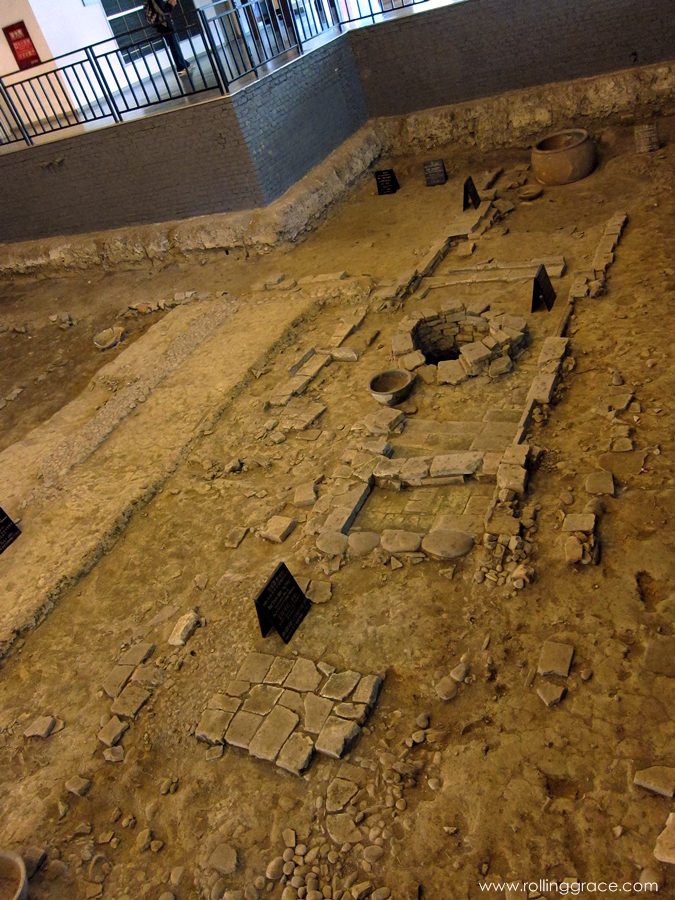 7 Stunning Things to See at Du Fu Thatched Cottage Chengdu 16 Excavated Tang Dynasty ruins with pottery and stone foundations in the Exhibition Hall at Du Fu Thatched Cottage Chengdu