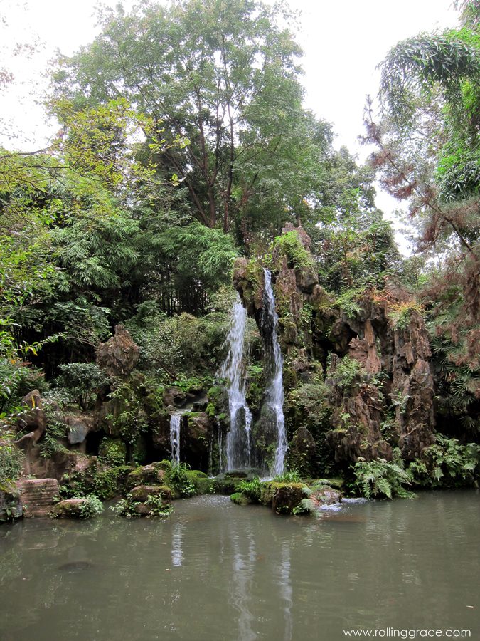 7 Stunning Things to See at Du Fu Thatched Cottage Chengdu 20 Traditional pavilion beside a still pond surrounded by trees at Du Fu Thatched Cottage Chengdu