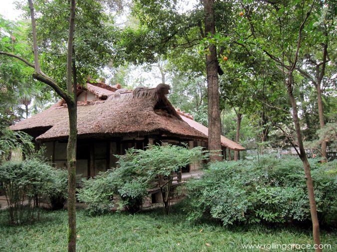 7 Stunning Things to See at Du Fu Thatched Cottage Chengdu 11 Thatched roof cottage with a small waterfall and lush garden at Du Fu Thatched Cottage Chengdu