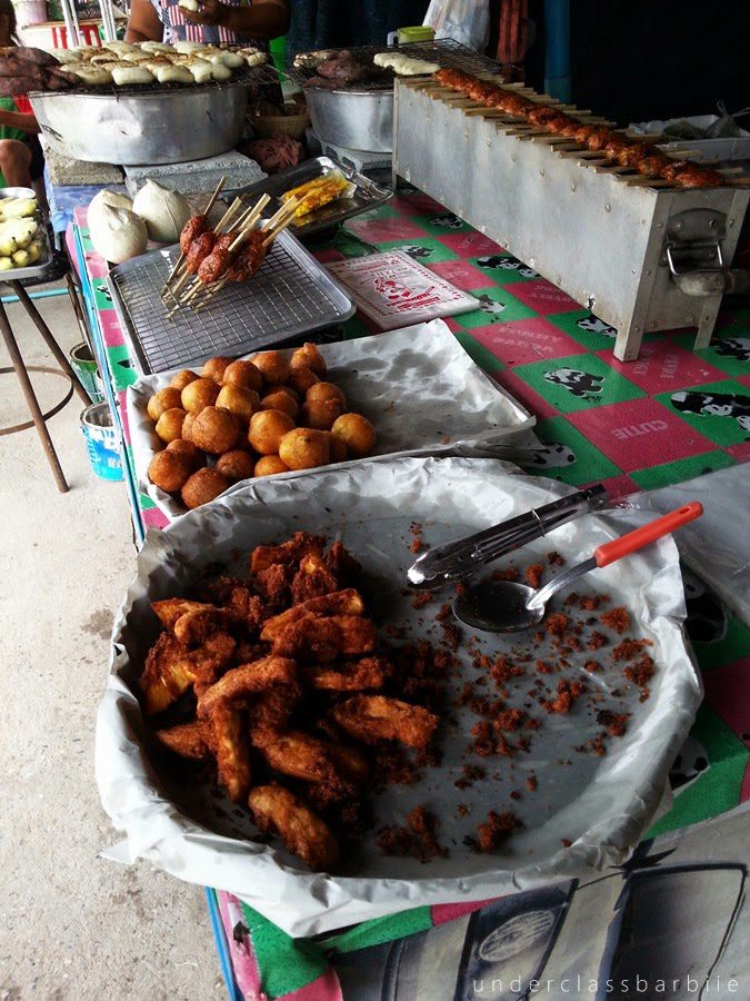 Koh Samet Thailand: 8 Best Relaxing Things to Do 10 Grilled seafood skewers including squid and prawns at a beachside stall on Koh Samet Thailand
