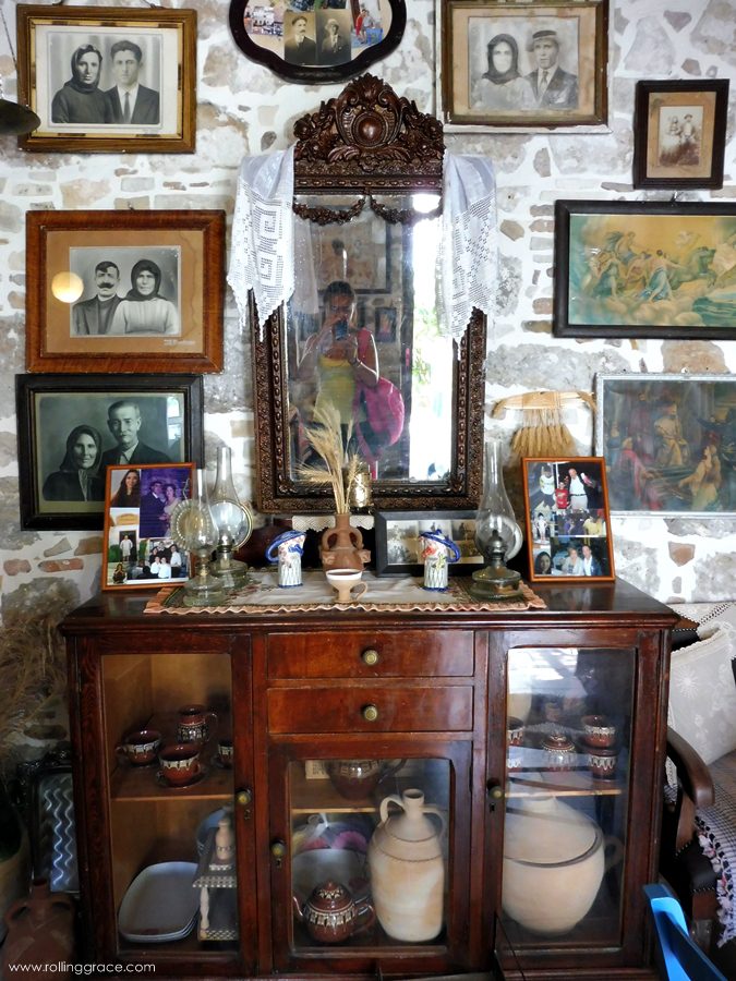 Exploring Kos Greece: 10 Most Stunning Things to Do 13 Interior of a restored traditional house in Antimachia village at Kos Island Greece with decorative plates and antique furniture