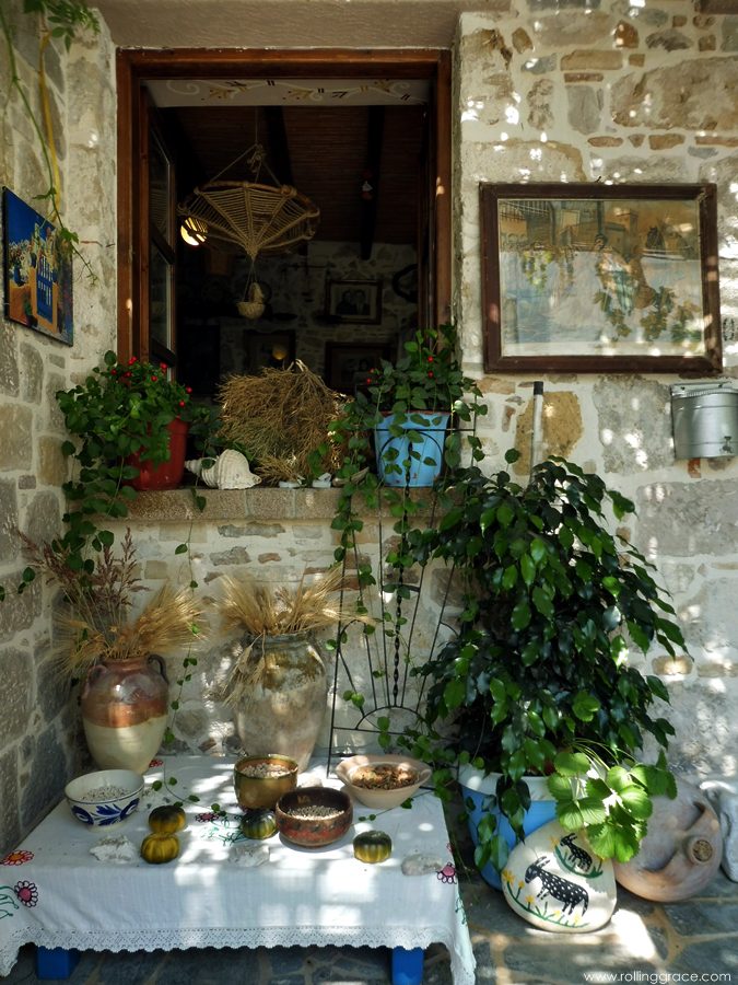 Exploring Kos Greece: 10 Most Stunning Things to Do 15 Wall covered in decorative plates and religious icons inside a traditional house in Antimachia at Kos Island Greece
