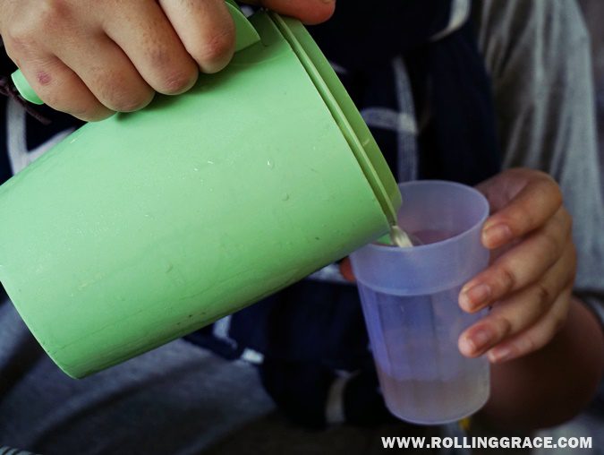 Fresh air nira nipah being poured into a cup at Ladang Nipah Kipli Perlis