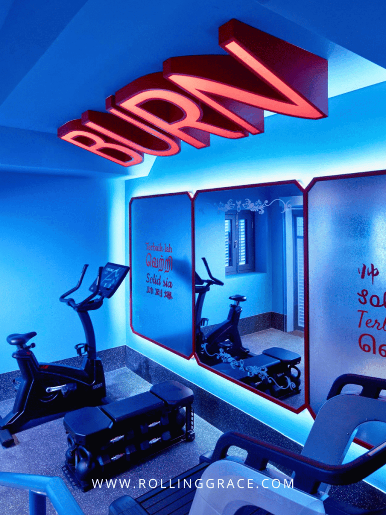 BURN gym with exercise bikes and blue lighting at lyf Chinatown Singapore