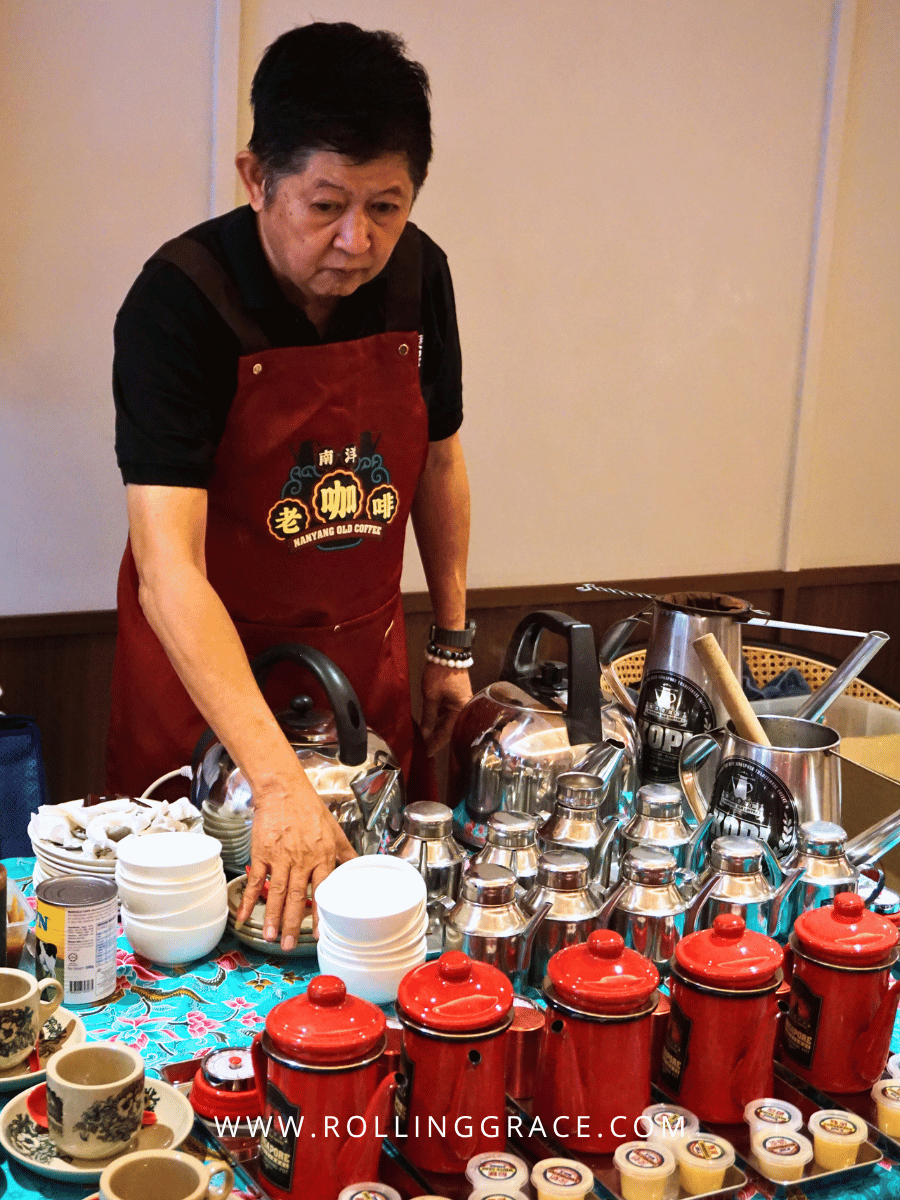 Staff preparing traditional kopi and kaya toast during a communal activity at lyf Chinatown Singapore