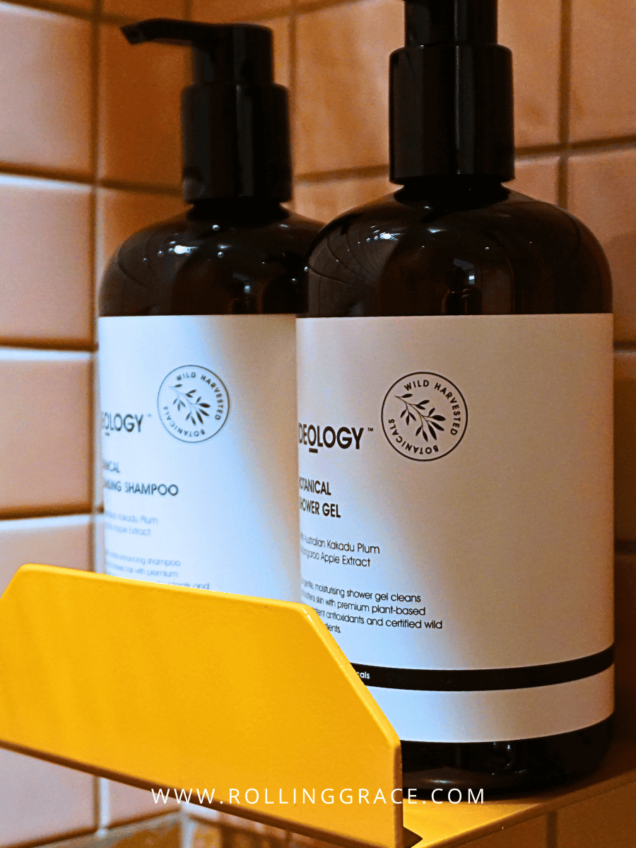 Refillable shampoo and body wash dispensers in the bathroom at lyf Chinatown Singapore