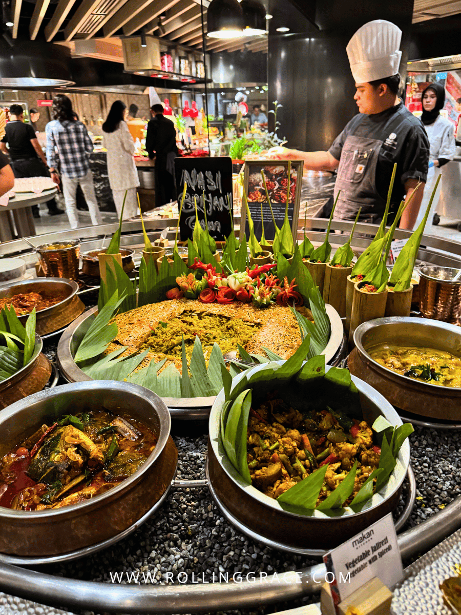 Makan Kitchen DoubleTree by Hilton: 9 Merdeka Dishes to Try 8 Chef preparing dishes at the live cooking station at Makan Kitchen DoubleTree by Hilton Putrajaya Lakeside