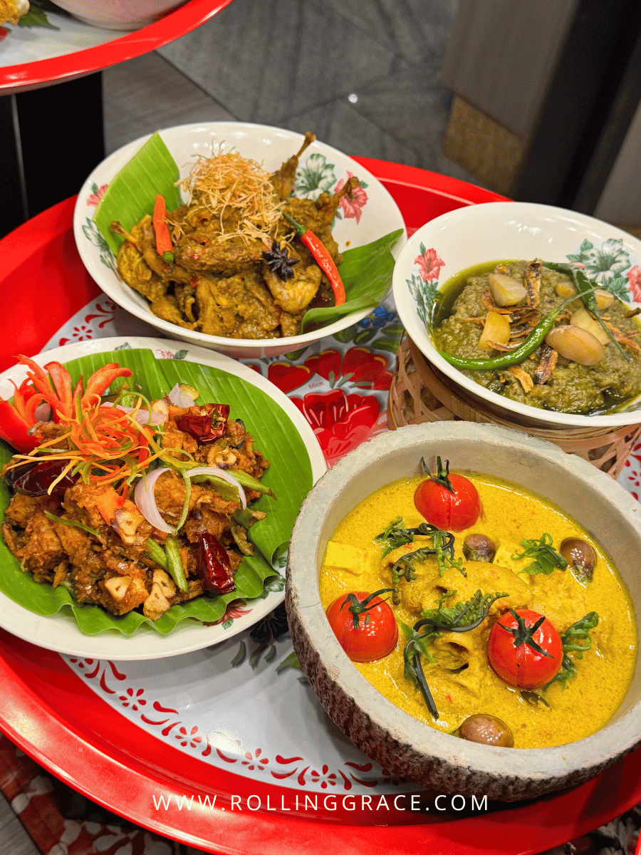 Makan Kitchen DoubleTree by Hilton: 9 Merdeka Dishes to Try 6 Red tray of Malaysian heritage curries and rendang at Makan Kitchen DoubleTree by Hilton Putrajaya Lakeside