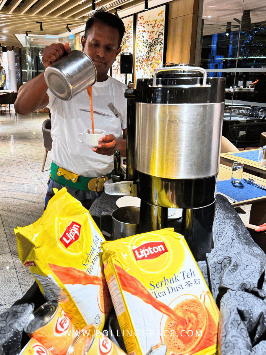 Makan Kitchen DoubleTree by Hilton: 9 Merdeka Dishes to Try 4 Chef at the teh tarik live station during the Merdeka dinner buffet at Makan Kitchen DoubleTree by Hilton Putrajaya Lakeside