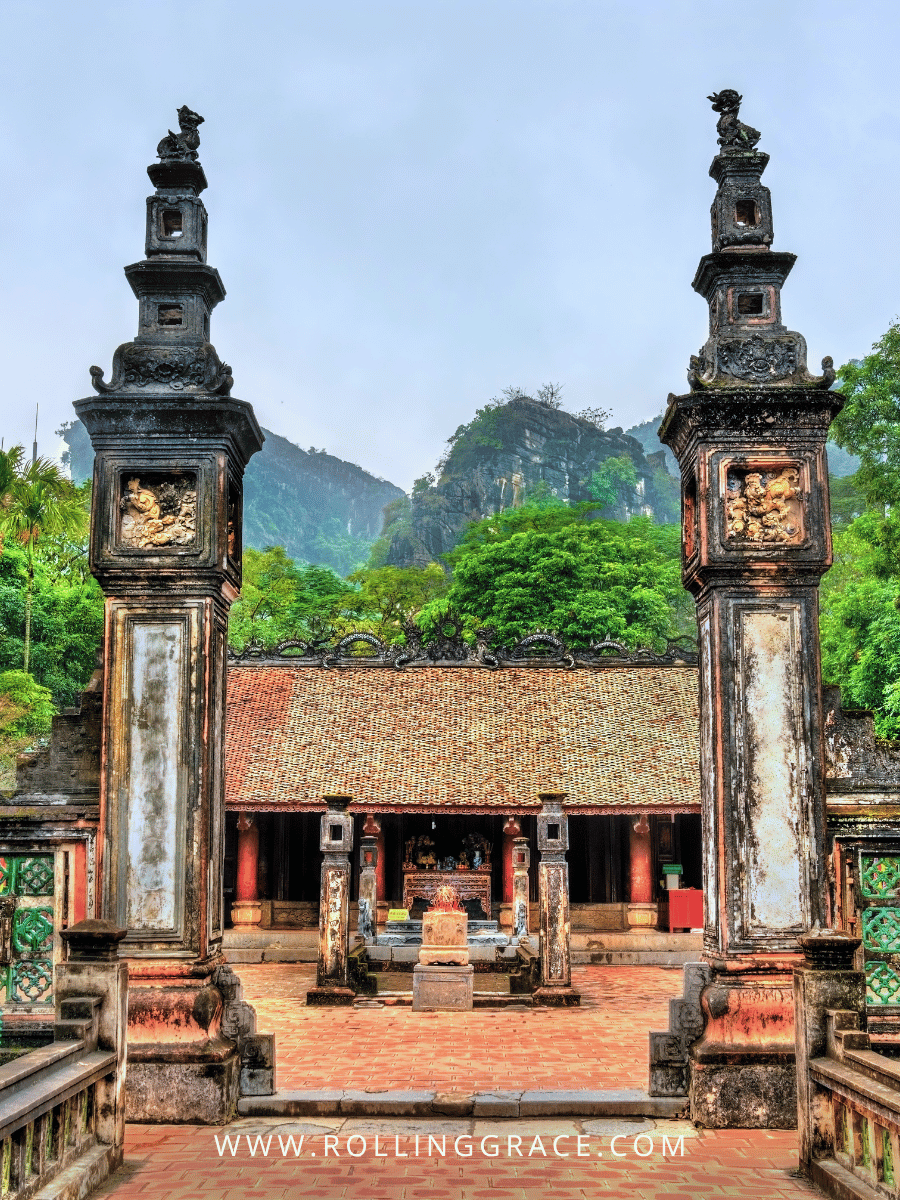 Stone entrance and carved pillars at Dinh King Temple inside Hoa Lu Ancient Capital Ninh Binh