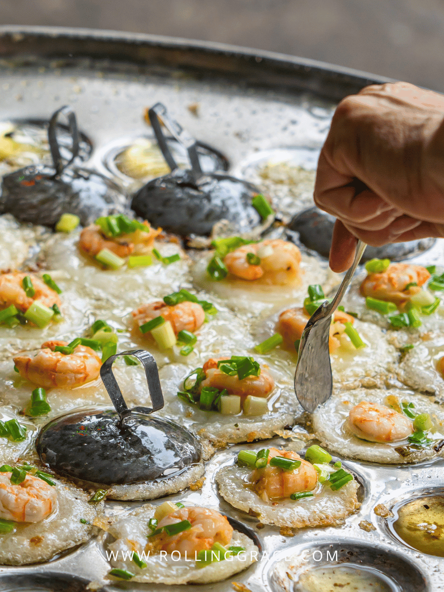 9 Best Vũng Tàu Attractions You Can't Miss in Vietnam 13 Bánh khọt crispy turmeric shrimp pancakes served at a street food stall in Vũng Tàu Vietnam