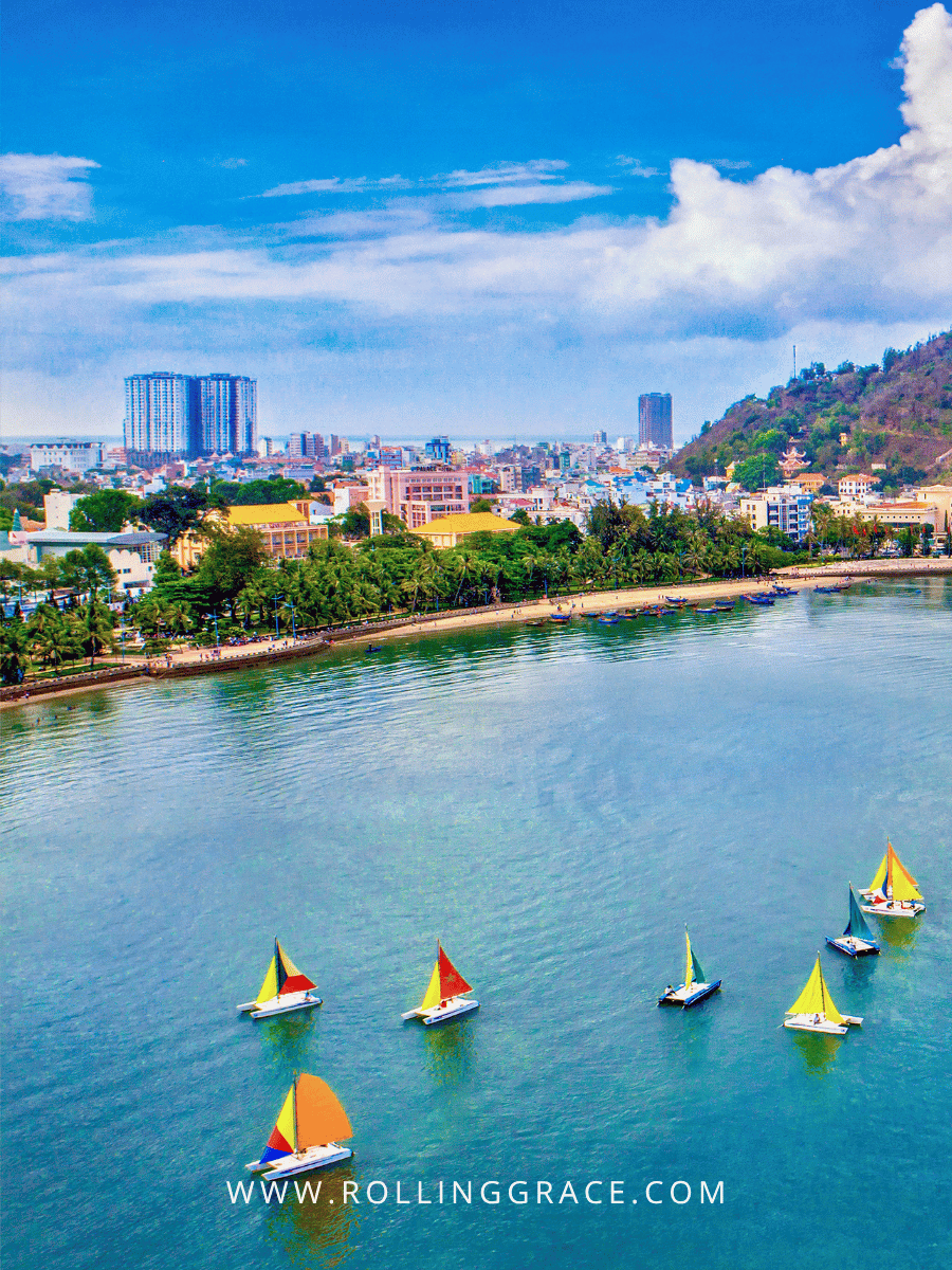 9 Best Vũng Tàu Attractions You Can't Miss in Vietnam 11 Colourful sailboats on turquoise water during island hopping from Vũng Tàu Vietnam