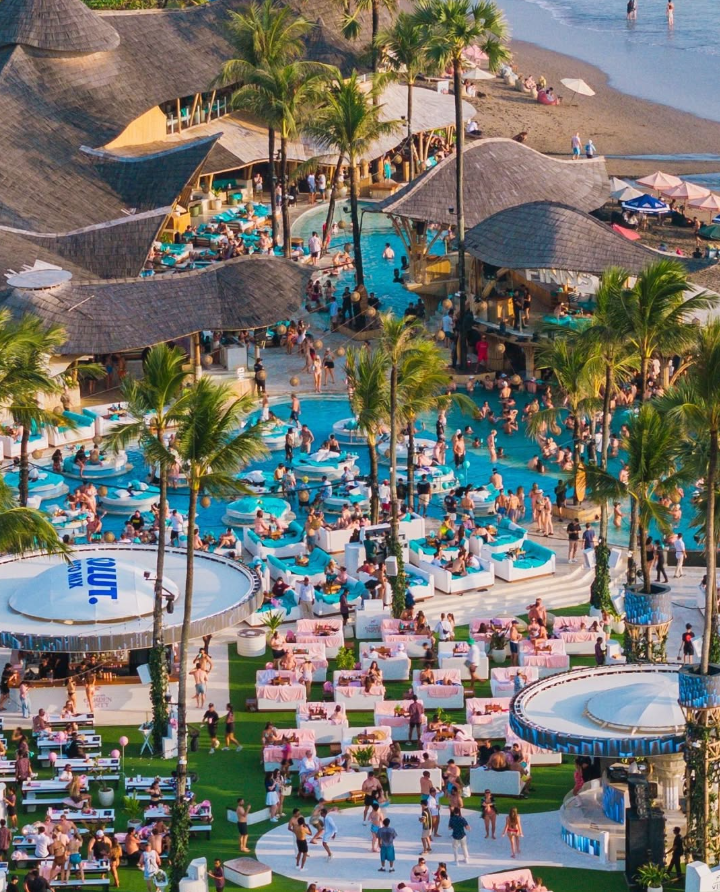 12 Best Shisha in Bali: Hookah in Canggu, Seminyak & Ubud 10 Aerial view of FINNS Beach Club in Canggu with pools and ocean, one of the best shisha in Bali beachfront spots featured by Rolling Grace