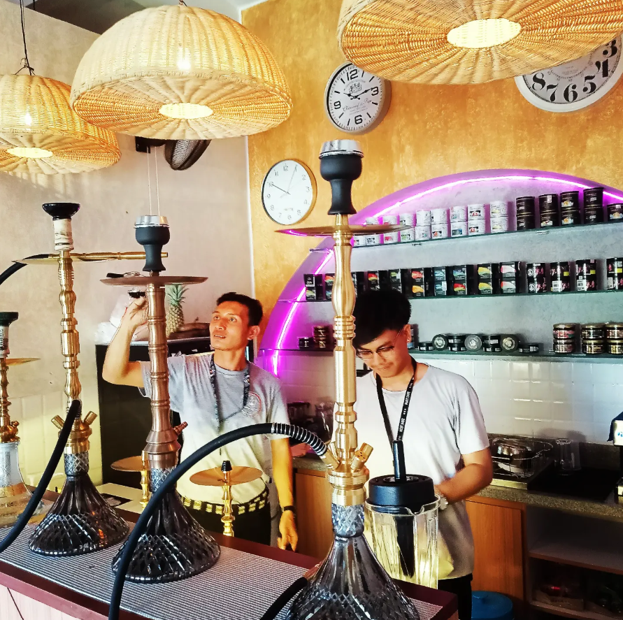12 Best Shisha in Bali: Hookah in Canggu, Seminyak & Ubud 5 Decorative interior of The Shisha House Seminyak with Middle Eastern-inspired ceiling lights, featured in Rolling Grace best shisha in Bali guide
