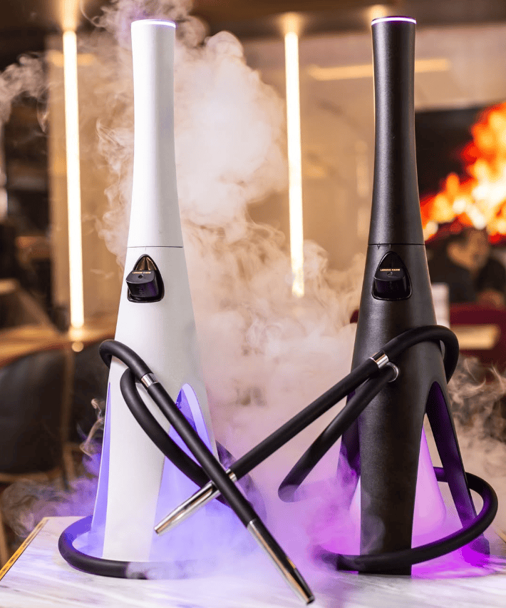 White Lounge Shisha Schöneberg Berlin with dark hookah pipe and purple LED lighting