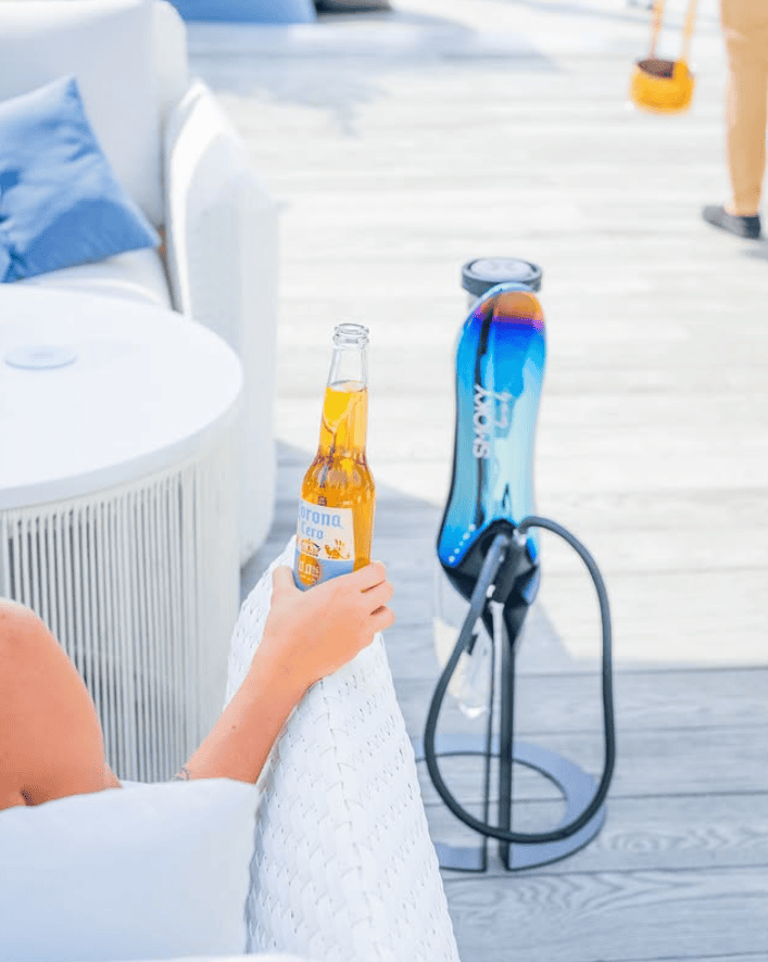 Smoky Beach JBR colourful drinks and shisha setup with Arabian Gulf beachfront view
