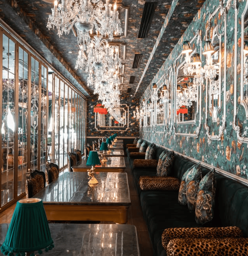 Yara Jumeirah restaurant and shisha lounge interior with teal velvet seating and bold decor
