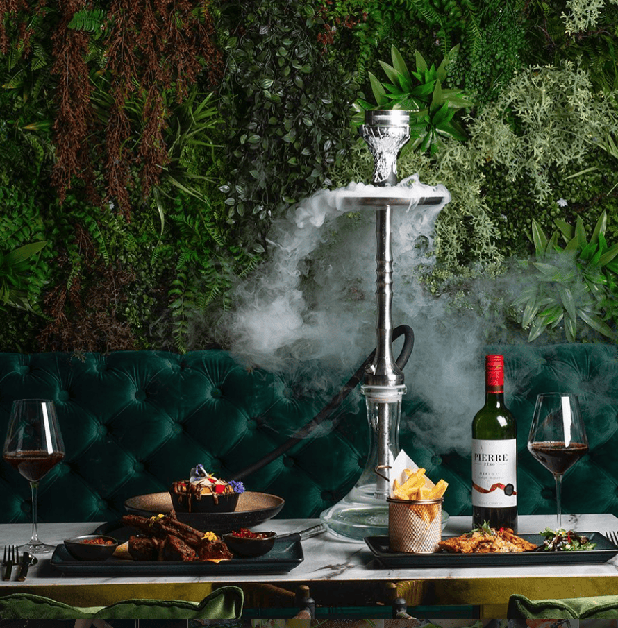 Coco Grill and Lounge Tower Bridge with hookah pipe and Mediterranean dishes on an outdoor terrace