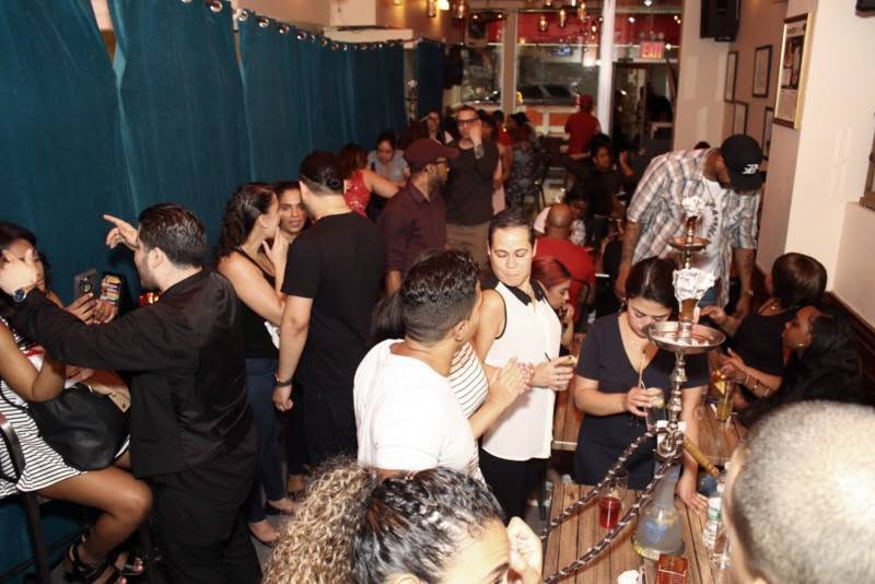 Café Nuñez Midtown Manhattan crowded evening atmosphere with Latin American food and hookah service