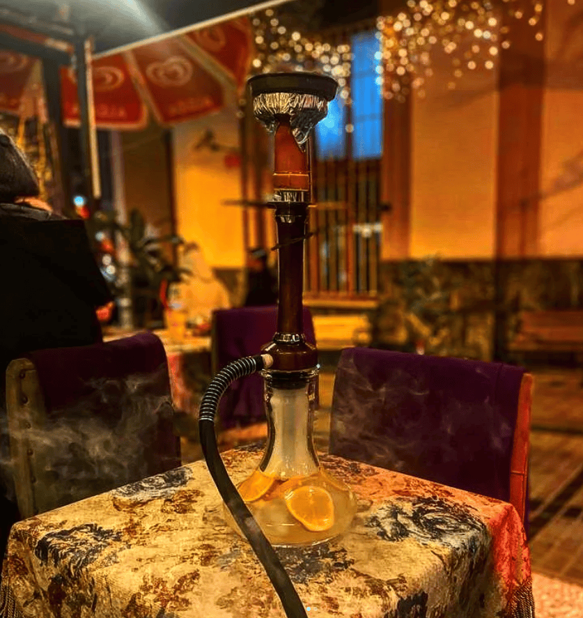 Best Shisha in Istanbul, Turkey: 10 Amazing Nargile to Try 12 Plush red and purple seating with ornate decor inside Ehli Keyf Cafe in Istanbul