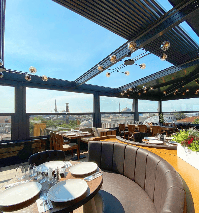 Best Shisha in Istanbul, Turkey: 10 Amazing Nargile to Try 10 Glass-walled rooftop terrace with modern seating at Loti Roof Lounge in Istanbul