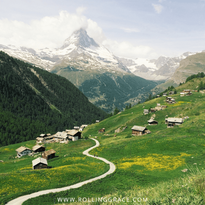 Alpine mountain scenery with hiking trails and green valleys in Switzerland one of the safest countries for solo female travel