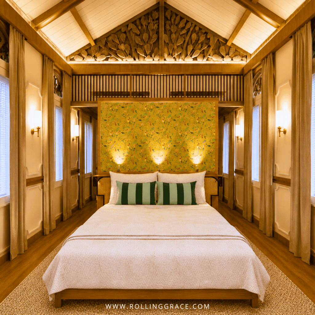 King bed with striped cushions in the Ying Suite, Ipoh House Collection at Temple Tree Resort Langkawi